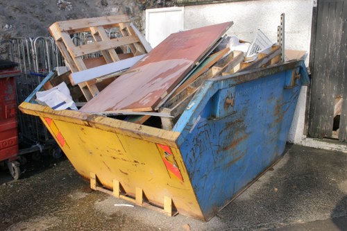 Professional team removing office furniture during clearance in Barking